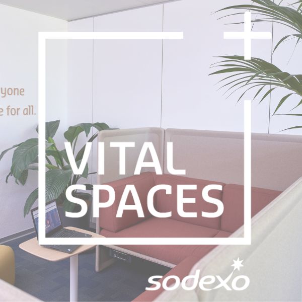 Vital Spaces logo with a sofa in the background